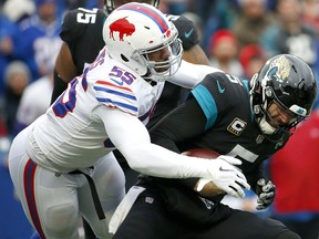 Buffalo Bills defensive end Jerry Hughes (55) sacks Jacksonville Jaguars quarterback Blake Bortles Sunday, Nov. 25, 2018, in Orchard Park, N.Y. (AP Photo/Jeffrey T. Barnes)