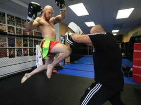 MMA fighter Kyle "The Monster" Nelson, 27, of Huntsville, Ont., during a training session with Alin Halmagean at House of Champions in Stoney Creek on Wednesday, Nov. 28, 2018. (Stan Behal/Toronto Sun/Postmedia Network)