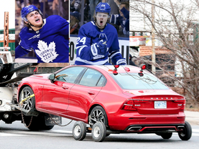 A red volvo gets towed away after forwards William Nylander and Kasperi Kapanen were involved in a minor vehicle collision outside the team’s practice facility. According to the Leafs, there were no injuries as a result of the accident in Toronto on Friday December 7, 2018. (Dave Abel/Toronto Sun/Postmedia Network)