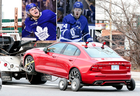 A red volvo gets towed away after forwards William Nylander and Kasperi Kapanen were involved in a minor vehicle collision outside the team’s practice facility. According to the Leafs, there were no injuries as a result of the accident in Toronto on Friday December 7, 2018. (Dave Abel/Toronto Sun/Postmedia Network)
