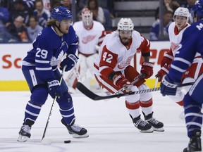 Maple Leafs' William Nylander RW (29) tries to make a pass past Detroit Red Wings Martin Frk during the second period in Toronto on Friday December 7, 2018. Jack Boland/Toronto Sun/Postmedia Network