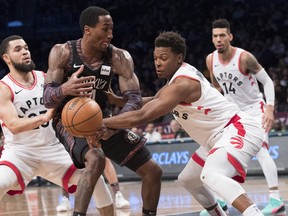 Toronto Raptors guard Kyle Lowry (front right) has attempted 23 shots and made just four over the past three games.  (AP)
