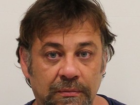Cops say Michael Maletin, 48, is charged with extortion in a scheme cops say threatened to expose Ashley Madison users with exposure.