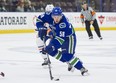 Vancouver Canucks Michael Carcone skates in alone on the Edmonton Oilers net during NHL preseason hockey action  September, 11, 2017. (Richard Lam/Postmedia)