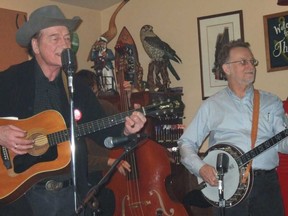 Duncan Freeman (right) is pictured playing with Stompin’ Tom Connors. (Handout)