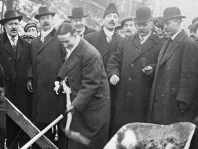 It’s Jan. 16, 1915, and Toronto Mayor Tommy Church does the honours as he turns the first sod to start actual construction of the Don Section of the new Bloor Street Viaduct. The iconic structure is actually made up of three components, the Don Section at 494 metres in length over the Don River and Valley, the Rosedale Section at 177 metres over the Rosedale Valley Rd. and the Rosedale Valley and the Bloor Section, 477 metres in length and laid out on an existing embankment located between Sherbourne and Parliament Sts. for a total length 1,605 metres. City council changed the structure’s name to the present Prince Edward Viaduct soon after the Prince of Wales crossed the viaduct in an automobile during his visit to Toronto in Aug. 1919. There was no ceremony nor is there any record of what the Prince thought of the new structure. After all massive viaducts are a common sight throughout Great Britain.