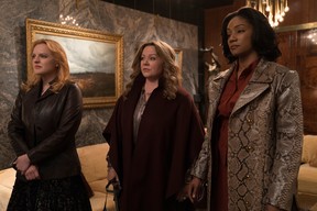 Elisabeth Moss, Melissa McCarthy and Tiffany Haddish in a scene from The Kitchen. (Warner Bros.)