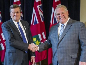 Toronto Mayor John Tory (left) visits Ontario Premier Doug Ford at his office at Queen's Park in Toronto, Ont. on Thursday December 6, 2018.
