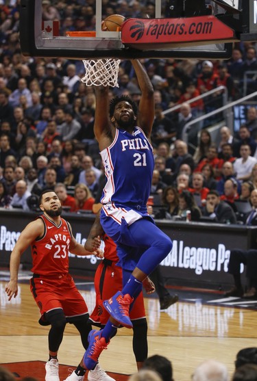 Philadelphia 76ers Joel Embiid C (21) drains a slam during the first quarter in Toronto, Ont. on Thursday December 6, 2018. Jack Boland/Toronto Sun/Postmedia Network