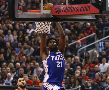 Philadelphia 76ers Joel Embiid C (21) drains a slam during the first quarter in Toronto, Ont. on Thursday December 6, 2018. Jack Boland/Toronto Sun/Postmedia Network