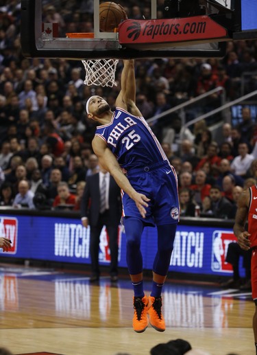 Philadelphia 76ers Ben Simmons PG (25) goes in for the dunk during the second quarter in Toronto, Ont. on Thursday December 6, 2018. Jack Boland/Toronto Sun/Postmedia Network