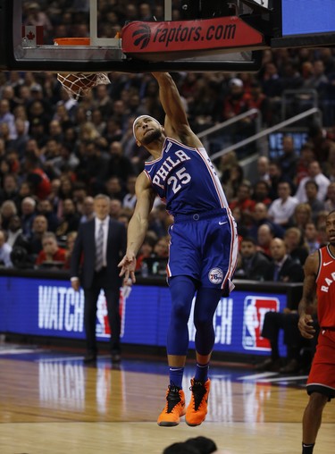 Philadelphia 76ers Ben Simmons PG (25) goes in for the dunk during the second quarter in Toronto, Ont. on Thursday December 6, 2018. Jack Boland/Toronto Sun/Postmedia Network