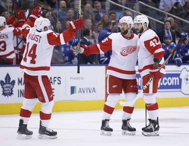 Detroit Red Wings celebrate the fourth goal of the game during the second period in Toronto on Thursday December 6, 2018. Jack Boland/Toronto Sun/Postmedia Network