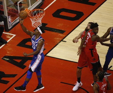 Philadelphia 76ers Jimmy Butler SG (23) goes for a layup during the fourth quarter in Toronto, Ont. on Thursday December 6, 2018. Jack Boland/Toronto Sun/Postmedia Network