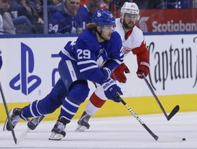 Toronto Maple Leafs William Nylander RW (29) wheels the puck up the ice past Detroit Red WingsMike Green D (25) during the second period in Toronto on Friday December 7, 2018. Jack Boland/Toronto Sun/Postmedia Network