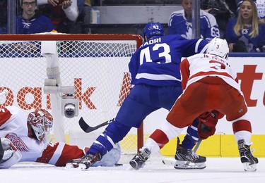 Detroit Red Wings Jonathan Bernier G (45) stretches out to rob Toronto Maple Leafs Nazem Kadri C (43) during the second period in Toronto on Friday December 7, 2018. Jack Boland/Toronto Sun/Postmedia Network