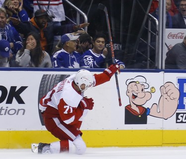 Detroit Red Wings Dylan Larkin C (71) scores the winner in OT  in Toronto on Friday December 7, 2018. Jack Boland/Toronto Sun/Postmedia Network