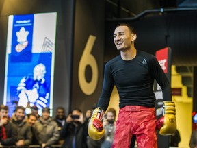 Mixed martial artist Max Holloway has a little fun holding court during UFC open workouts at the Scotiabank Arena yesterday.  Ernest Doroszuk/Toronto Sun