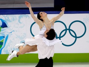 Canada’s Tessa Virtue and Scott Moir perform their free dance in the ice dance competition at the 2010 Vancouver Olympic Winter Games in Vancouver on Feb. 22, 2010.