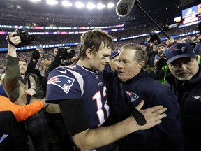 New England Patriots quarterback Tom Brady (left) and coach Bill Belichick celebrate one of their many victories. (AP PHOTO)