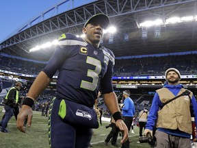 Seattle Seahawks quarterback Russell Wilson will take on the Cowboys in Dallas on Saturday night. (AP PHOTO)