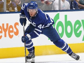 Morgan Rielly #44 of the Toronto Maple Leafs skates with the puck against the New York Rangers during an NHL game at Scotiabank Arena on December 22, 2018 in Toronto. (Claus Andersen/Getty Images)