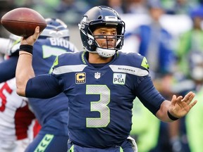 Russell Wilson #3 of the Seattle Seahawks throws the ball in the third quarter against the Arizona Cardinals at CenturyLink Field on December 30, 2018 in Seattle, Washington.