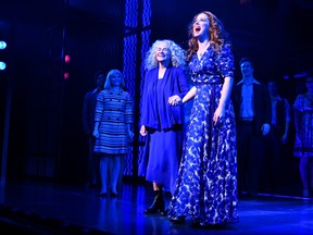 Carole King and Chilina Kennedy greet each other on stage as Carole King surprises Broadway audience as "Beautiful" celebrates Fifth Anniversary at Stephen Sondheim Theatre on Jan. 12, 2019 in New York City.  (Slaven Vlasic/Getty Images for "Beautiful")