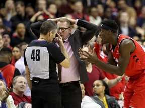 WASHINGTON, DC - JANUARY 13: Head coach Nick Nurse of the Toronto Raptors and Pascal Siakam #43 argue with referee Scott Foster #48 in overtime against the Washington Wizards Capital One Arena on January 13, 2019 in Washington, DC. NOTE TO USER: User expressly acknowledges and agrees that, by downloading and or using this photograph, User is consenting to the terms and conditions of the Getty Images License Agreement. (Photo by Rob Carr/Getty Images)