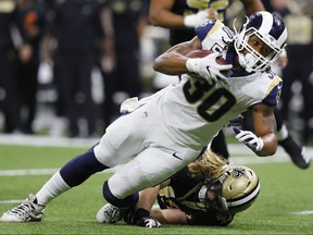 Todd Gurley of the Los Angeles Rams runs the ball against the New Orleans Saints during the fourth quarter  in the NFC Championship game at the Mercedes-Benz Superdome on January 20, 2019 in New Orleans, Louisiana. (Kevin C.  Cox/Getty Images)