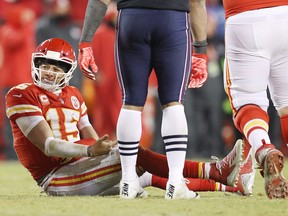 Patrick Mahomes of the Kansas City Chiefs reacts after a hit in the fourth quarter against the New England Patriots during the AFC Championship Game at Arrowhead Stadium on Jan. 20, 2019 in Kansas City, Missouri. (Patrick Smith/Getty Images)