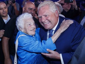 Ontario PC leader Doug Ford is congratulated by former Mississauga mayor Hazel McCallion after winning a majority government in the Ontario Provincial election in Toronto, on Thursday, June 7, 2018. (The Canadian Press)