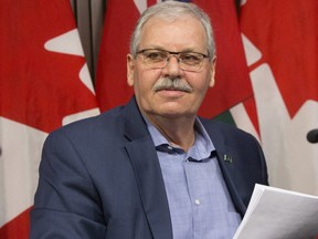 Warren (Smokey) Thomas, president of the Ontario Public Service Employees Union (OPSEU), speaks to reporters at Queens Park on Jan. 21, 2019. (The Canadian Press)