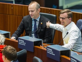 Councillors Joe Cressy (right) and Mike Layton are pictured during a Jan. 30 meeting of city council. (Ernest Doroszuk, Toronto Sun)