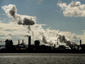 The steel mills on the Hamilton waterfront harbour are shown in Hamilton, Ont., on Tuesday, October 23, 2018. Canada's push to be a world leader in the fight against climate change may be hampered by its distinction for producing the most greenhouse gas emissions per person among the world's 20 largest economies.
