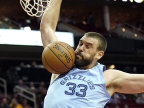 Memphis Grizzlies' Marc Gasol dunks the ball against the Houston Rockets earlier this week. (AP PHOTO)