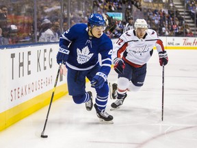 Toronto Maple Leafs' Trevor Moore skates away from a Washington Capitals player during Wednesday's game. (ERNEST DOROSZUK/Toronto Sun)