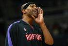 Vince Carter #15 of the Toronto Raptors fires up his teammates during pre-game warm ups as they prepare to face the Washington Wizards during NBA action on March 3, 2004 at the MCI Center in Washington, DC. (Photo by Doug Pensinger/Getty Images) 