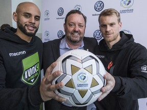 Kyle Porter (L) York9 player, CPL Commissioner, David Clanachan, (M) and Kyle Becker,(R)  Forge FC player at the announcement of the CPL's first game. Press conference  in Toronto, Ont. on Tuesday January 29, 2019. Craig Robertson/Toronto Sun/Postmedia Network