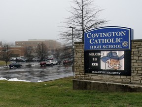 Fog covers Covington Catholic High School in Park Hills, Ky., Saturday, Jan 19, 2019. (AP Photo/Bryan Woolston)
