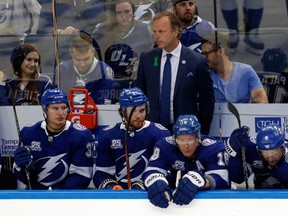 Head coach Jon Cooper of the Tampa Bay Lightning looks on against the Washington Capitals during the second period in Game One of the Eastern Conference Finals during the 2018 NHL Stanley Cup Playoffs at Amalie Arena on May 11, 2018 in Tampa, Florida.  (Photo by Mike Carlson/Getty Images)