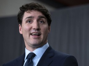 Prime Minister Justin Trudeau responds to questions during a news conference following a cabinet retreat in Sherbrooke, Que. on Friday, January 18, 2019.