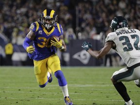 This photo taken Dec. 16, 2018, shows Los Angeles Rams' Todd Gurley carrying the ball during an NFL football game against the Philadelphia Eagles in Los Angeles.