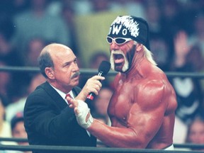 Announcer Gene Okerlund gets a word with Hulk Hogan during World Championship Wrestlings Nitro card at the Air Canada Centre in Toronto on March 29, 1999. (Toronto Sun files)