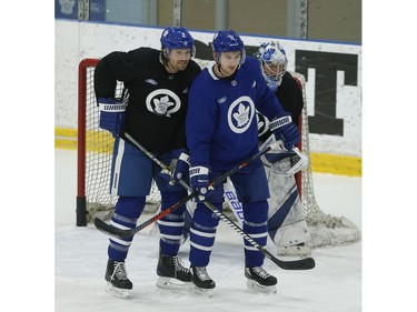 Toronto Maple Leafs Ron Hainsey D (2) with teammate Zach Hyman C (11) in front of Frederik Andersen G (31) during practice at the MCC in Toronto on Friday January 11, 2019. Jack Boland/Toronto Sun/Postmedia Network