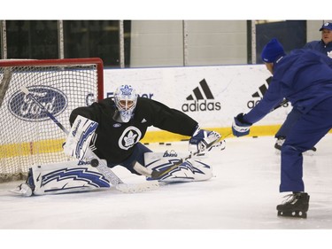 Toronto Maple Leafs Michael Hutchinson G (30) makes a save during practice at the MCC in Toronto on Friday January 11, 2019. Jack Boland/Toronto Sun/Postmedia Network