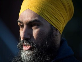 NDP Leader Jagmeet Singh is interviewed while door knocking for his byelection campaign, in Burnaby, B.C., on Saturday January 12, 2019.