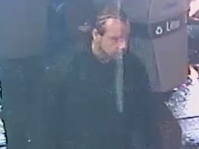 Suspect No. 1 in a New Year's Day assault of a man at Queen and Bathurst in Toronto.