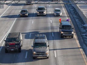 An Indigenous protest convoy drives at slow speed on Highway 401 westbound in Kingston, Ont., Friday Jan., 11, 2019, in support of pipeline protesters in British Columbia.