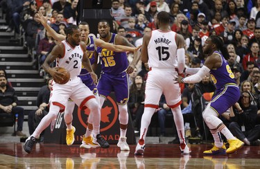 Toronto Raptors Kawhi Leonard SF (2) pushes off in the paint during the first quarter  in Toronto, Ont. on Tuesday January 1, 2019. Jack Boland/Toronto Sun/Postmedia Network